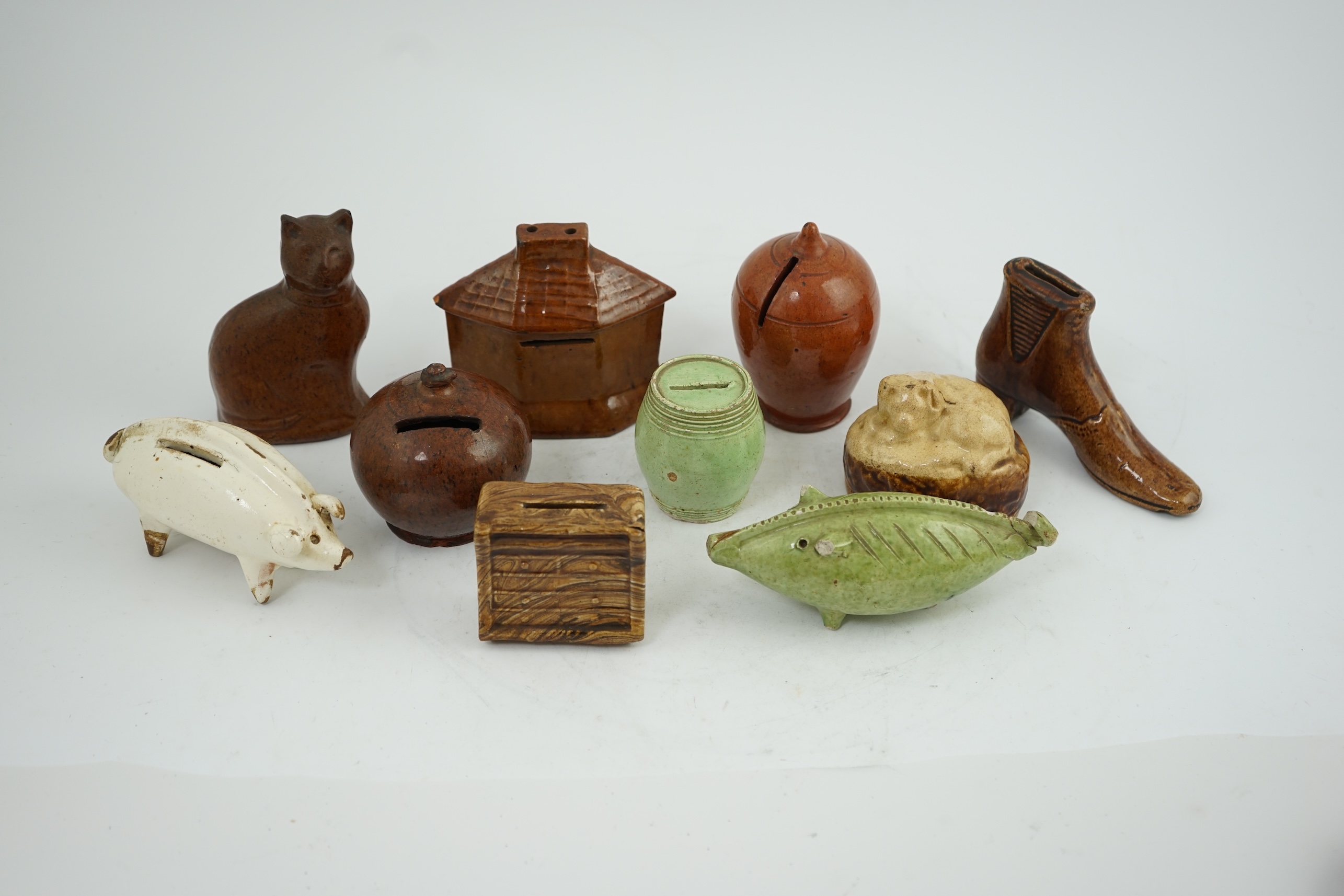 A collection of ten 19th century Dutch and British pottery money boxes